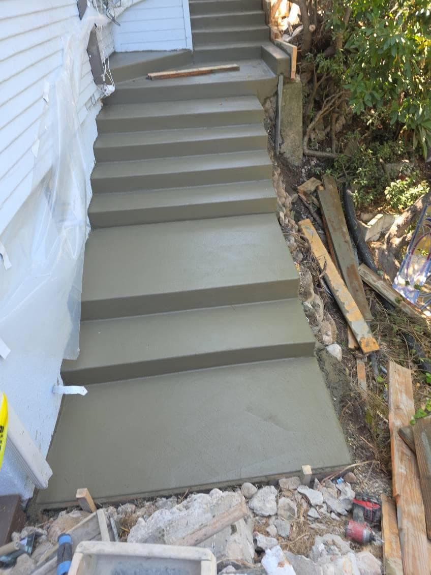 picture of concrete stair project being done in a residential home by nezt landscape